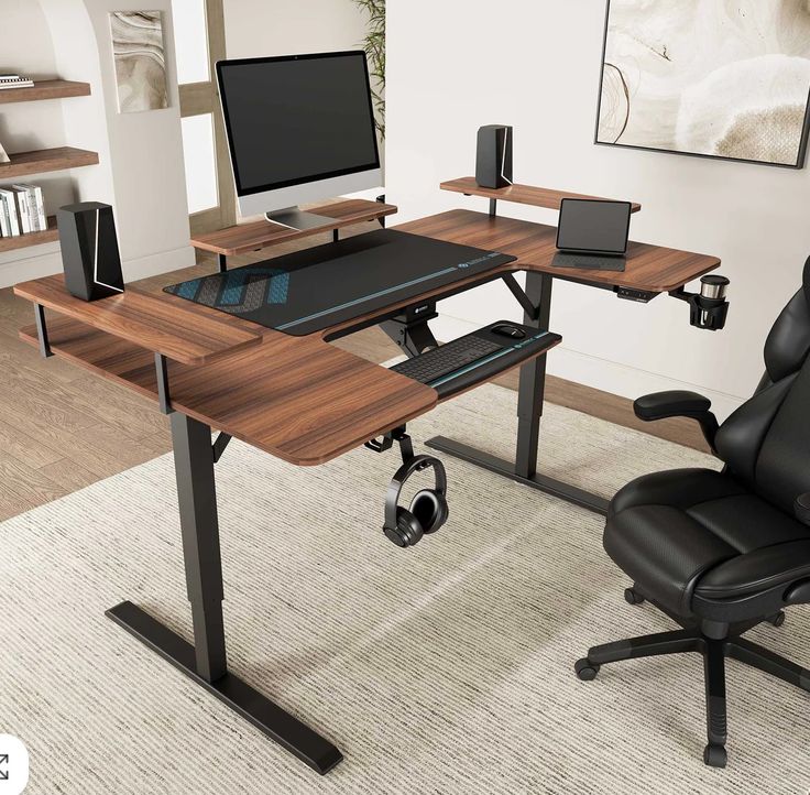 Ergonomic desk arrangement with adjustable monitor arm, keyboard tray, and supportive office chair